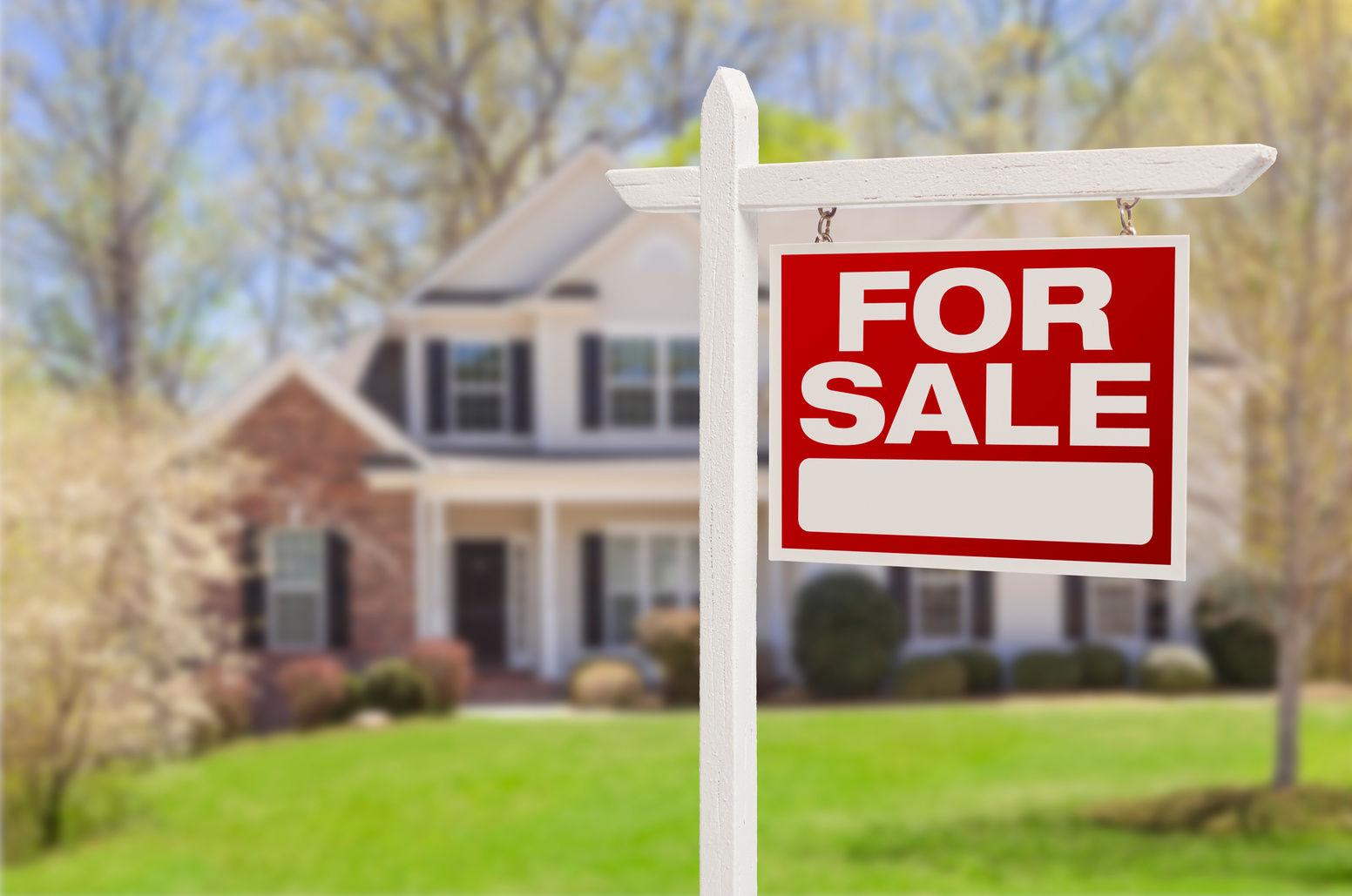 Home for Sale Sign in Front of New House